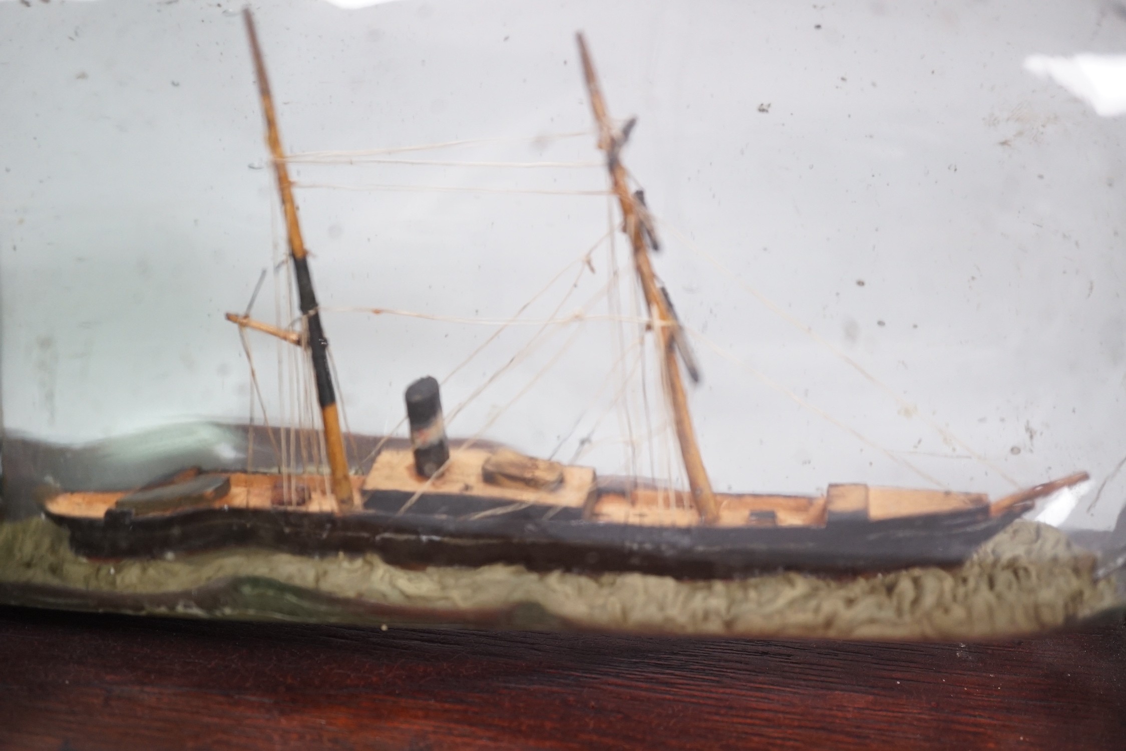 A Royal Doulton series ware bowl, a ship in a bottle and a Gordon Highlanders white metal mounted swagger stick